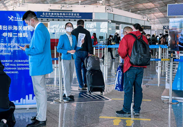 [China] Smooth entry into China [Society] No quarantine, people return to Beijing airport