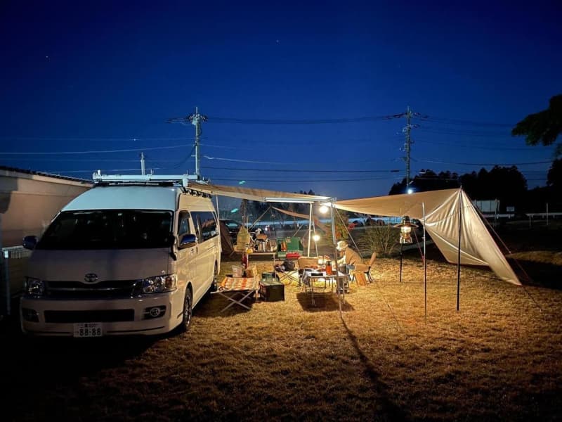 “What are the benefits of staying in the car at a campsite?” Why does the author, who has 40 years of camping experience, not choose to stay in a tent?