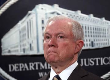 WASHINGTON, DC - JULY 13: U.S. Attorney General Jeff Sessions listens during a news conference to announce significant law enforcement actions July 13, 2017 at the Justice Department in Washington, DC. Attorney General Jeff Sessions held the...