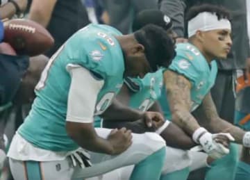 Dolphins players could be fined, suspended for kneeling during national anthem